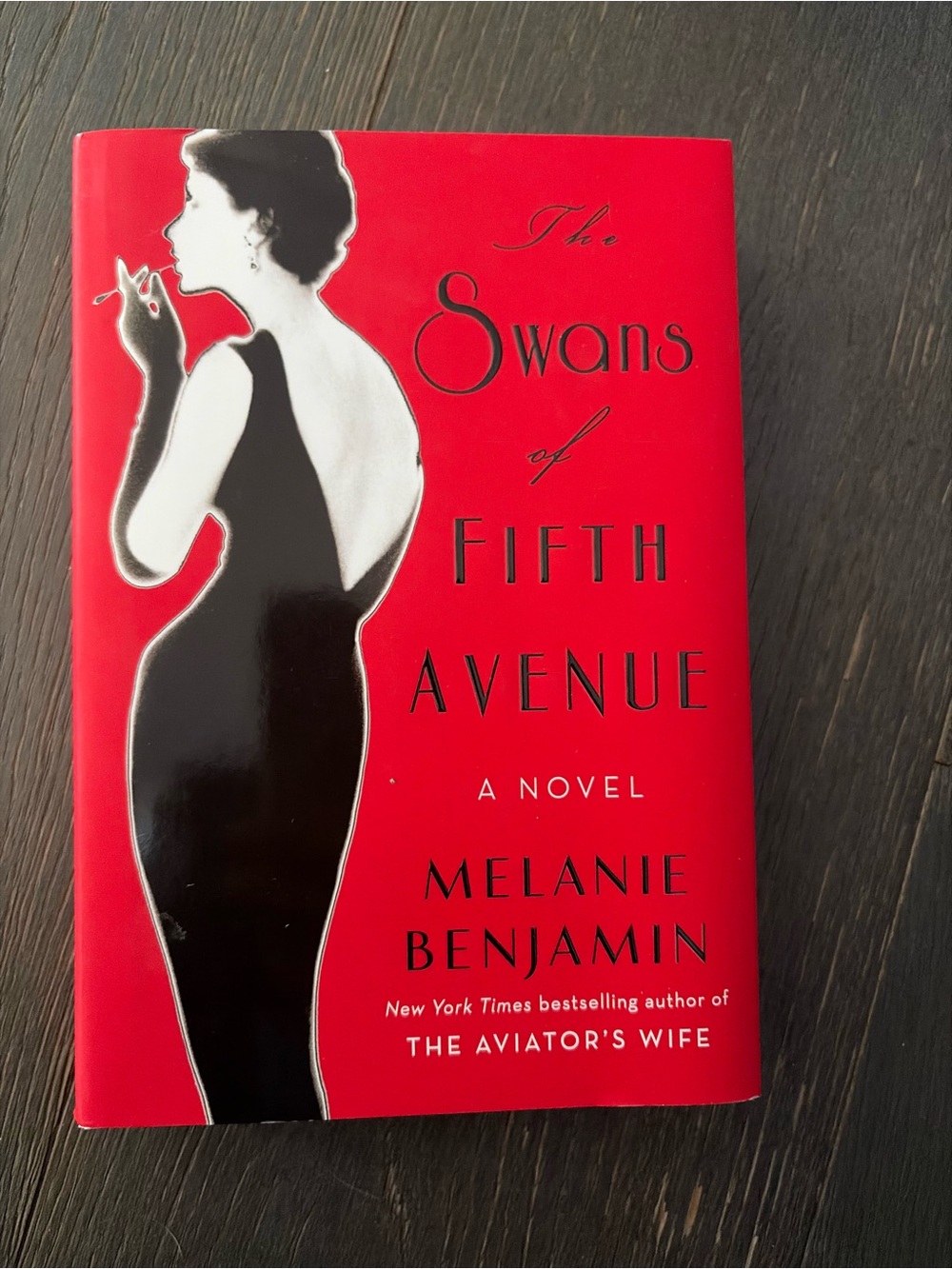 The Swans of Fifth Avenue by Melanie Benjamin - Red Hardcover Novel